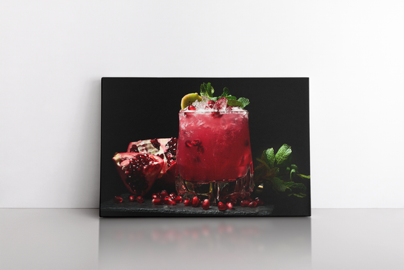 Pomegranate Cocktail on the Black Background